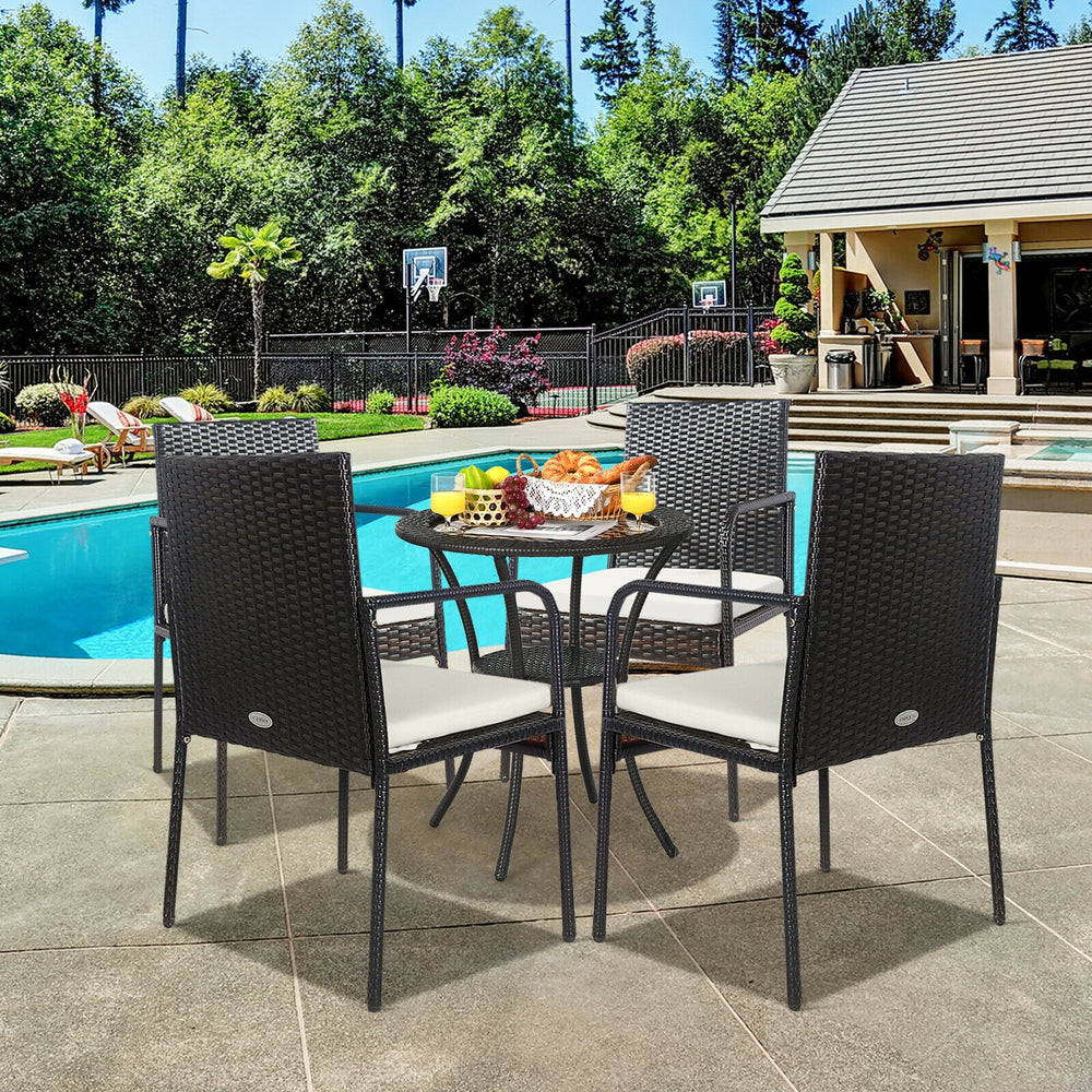 4-piece patio wicker rattan dining set with comfy cushions, perfect for outdoor dining by the poolside.