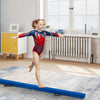 Child practicing on a blue 7 feet folding balance beam with handles, designed for gymnasts to enhance balance and.