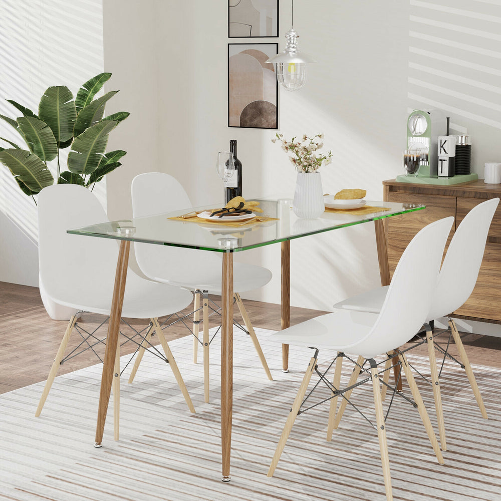 Rectangular glass dining table with wood grain imitation legs, perfect for home or office use, accommodating multiple.