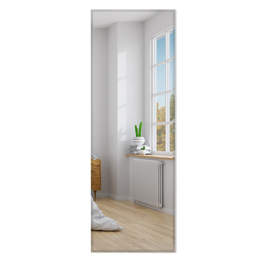 Frameless full-length mirror, 43 x 15 inches, mounted vertically in a bright room, ideal for checking outfits.