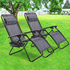 Side view of gray folding lounge chairs with adjustable backs and removable headrests, perfect for outdoor lounging.