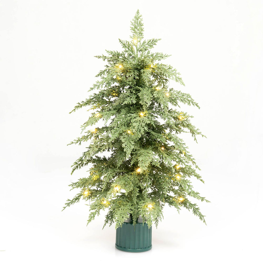 Pre-lit tabletop Christmas tree with PE branch tips and warm white LED lights, shown upright with rotating musical base.