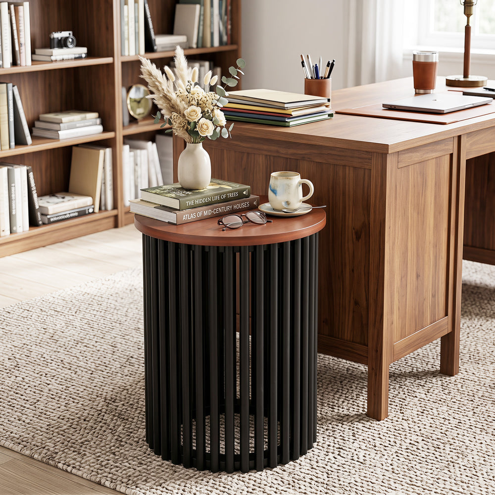 Elegant round coffee table in walnut finish, showcasing delicate surface details and solid wood legs for stability.