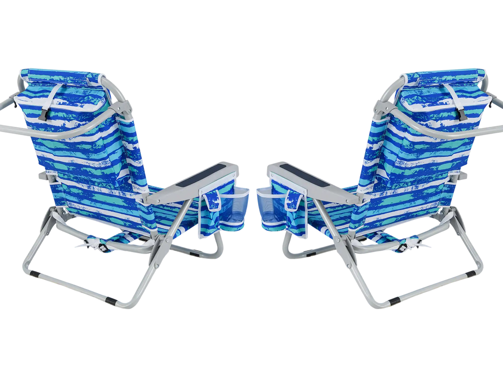Two navy foldable beach chairs with cup holders and storage pockets, set against a serene ocean backdrop.