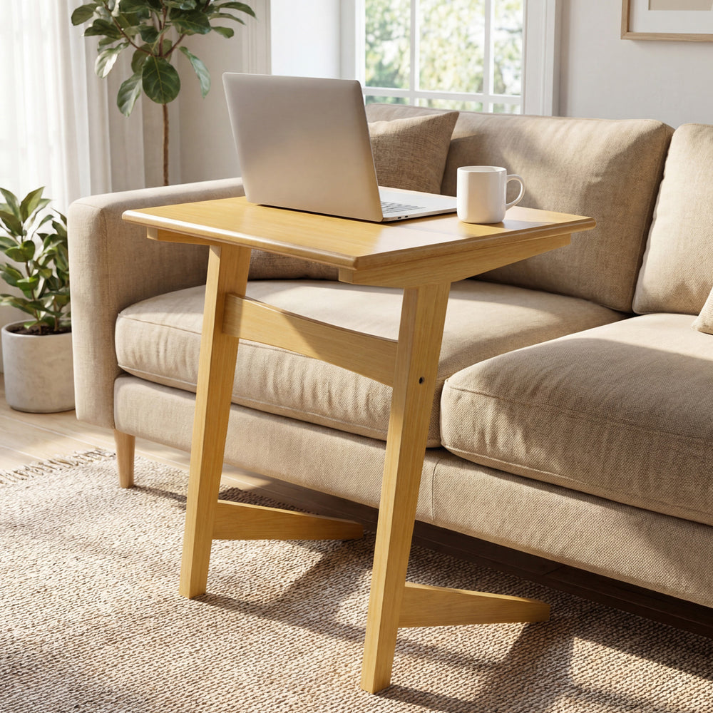 C-shaped wood side table with a veneered top, perfect for laptops and snacks, fits snugly beside a couch.