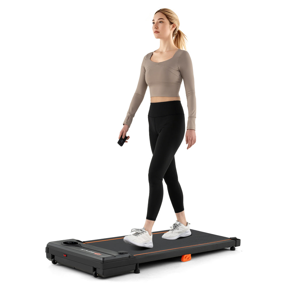Under desk treadmill with remote control, 2.5HP motor, 340 lbs capacity, compact design for home office use.