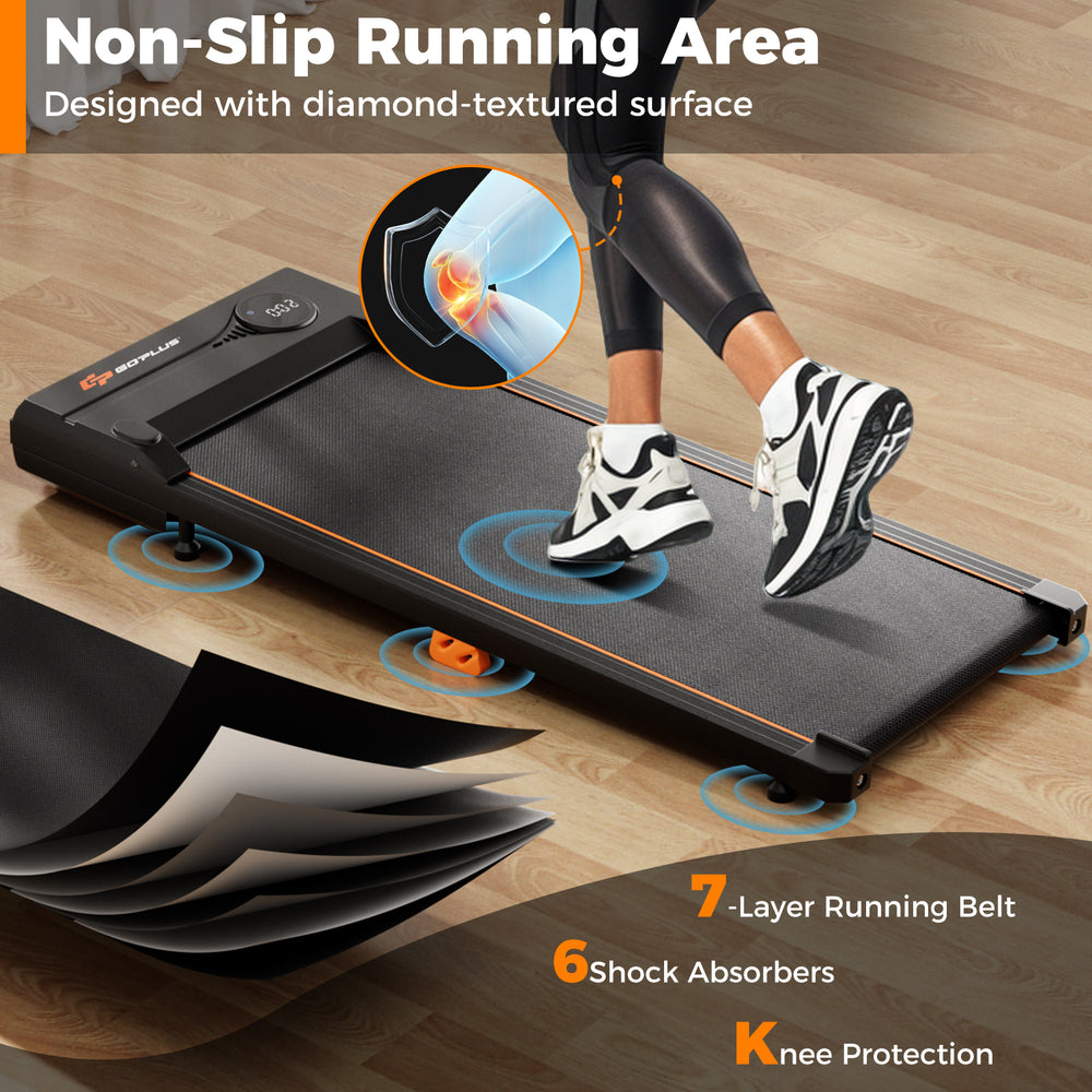 Close-up of the 7-layer anti-slip diamond-textured running belt on a 2.5HP under desk treadmill for home office use.