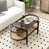 2-tier coffee table with tempered glass top and acacia wood frame, showcasing a stylish arrangement of decorative items.