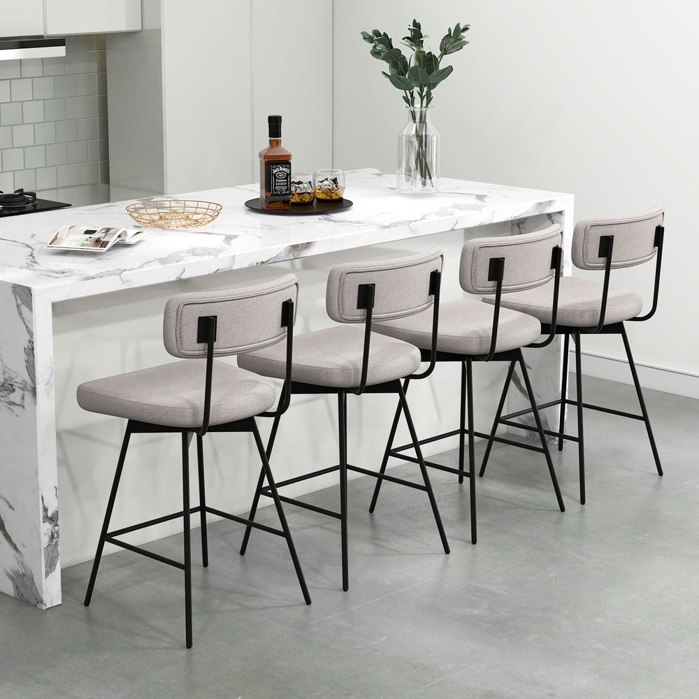 Set of two 25-inch modern beige upholstered bar stools with backrests and footrests, ideal for kitchen islands.