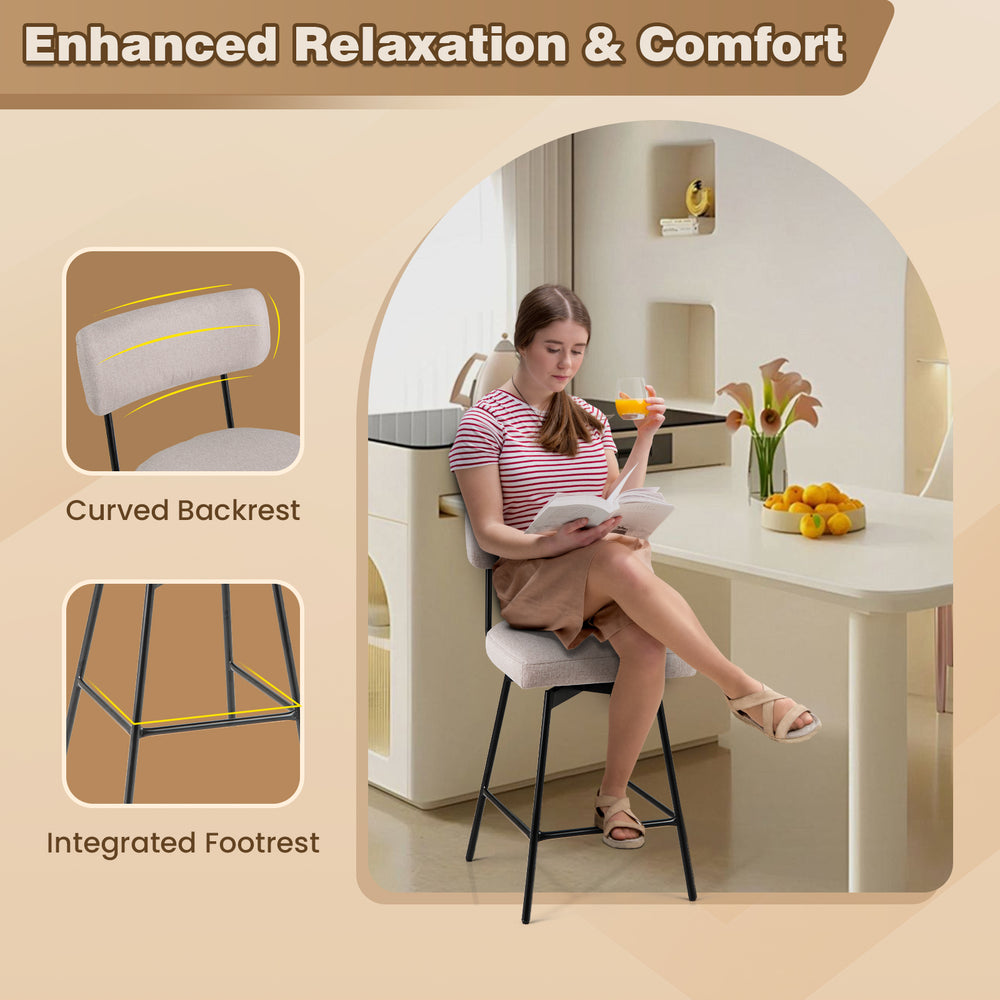 Beige upholstered bar stool with curved backrest and integrated footrest, perfect for kitchen islands and dining rooms.