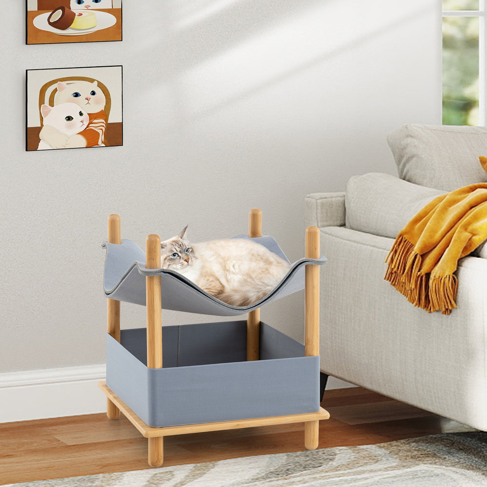 2-Tier wooden cat house in gray with hammock top, bamboo frame, and storage shelf for cat supplies. Ideal for cozy.
