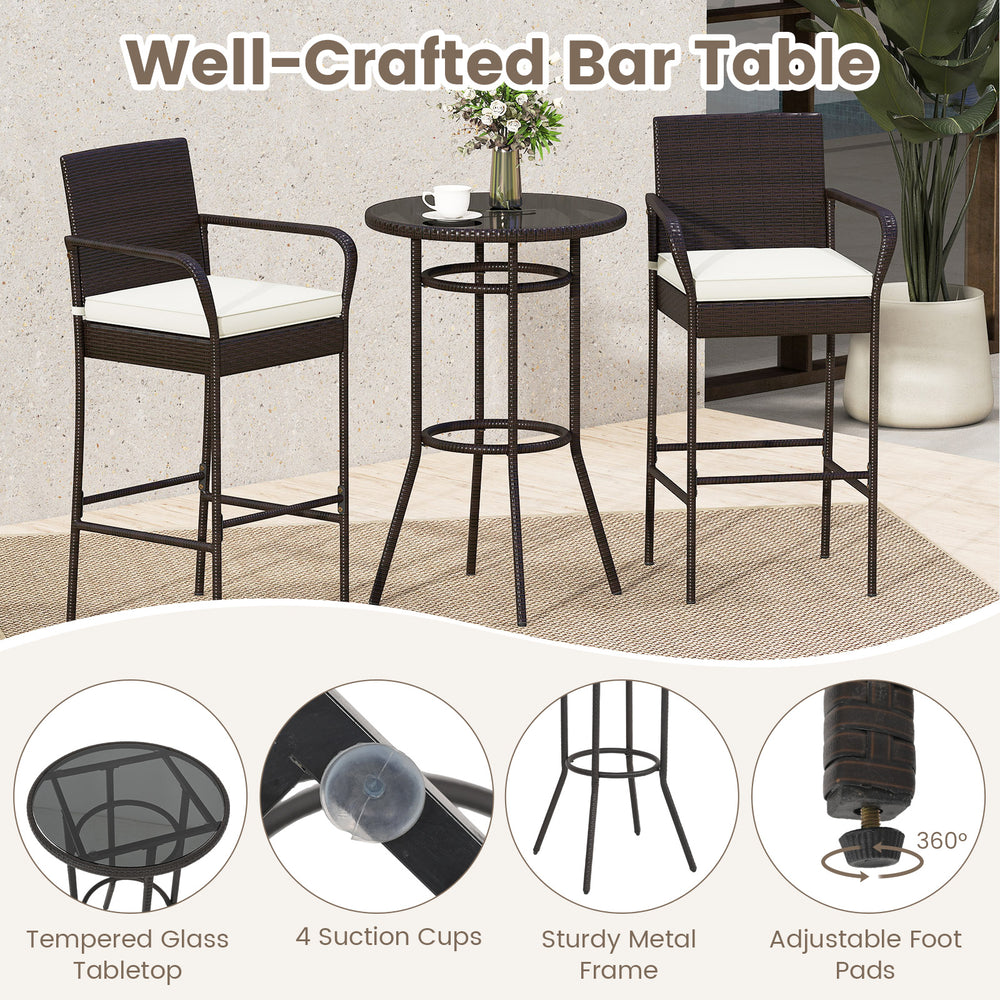 Bar height table with tempered glass top and two cushioned chairs, perfect for porch or poolside relaxation.
