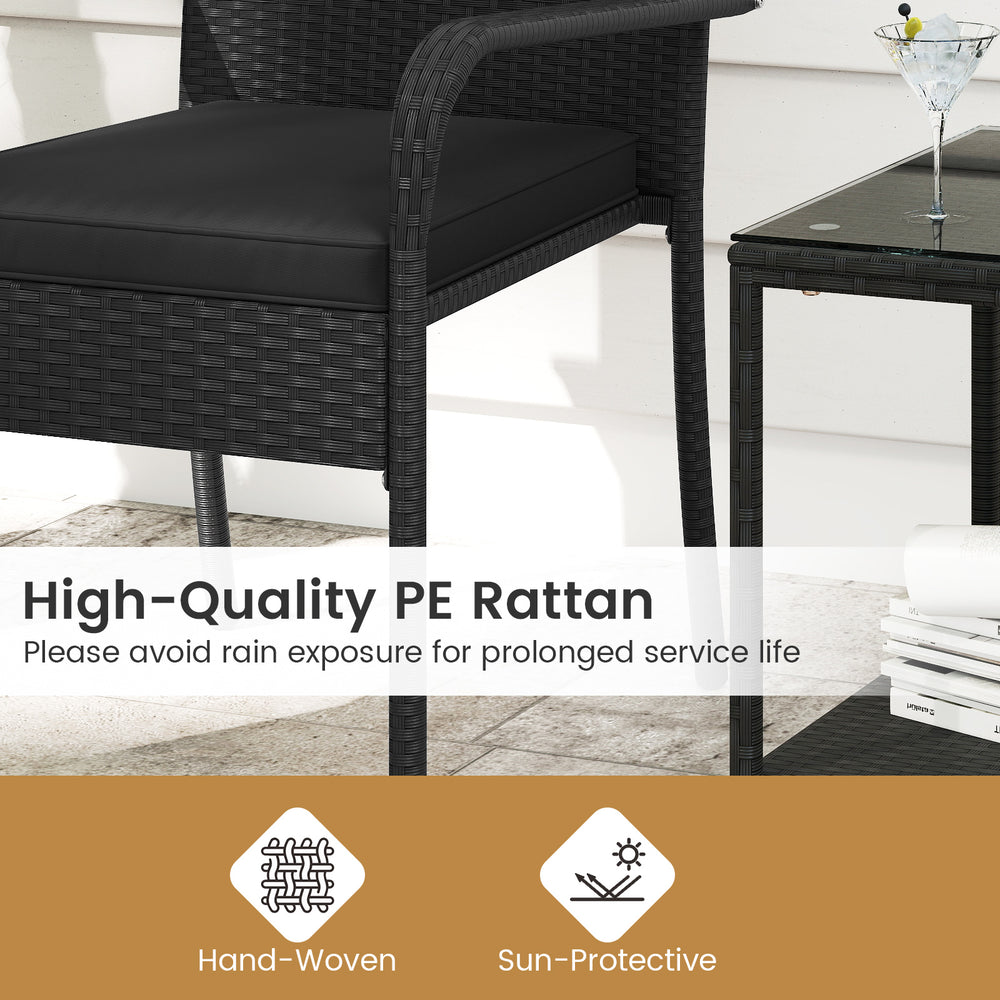 Black patio chair made of high-quality PE rattan with ergonomic design, featuring soft seat cushions for comfort.