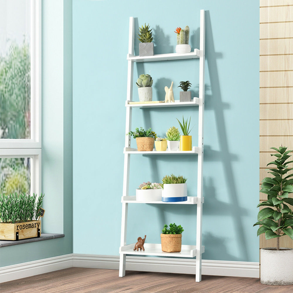 5-tier white wall-leaning ladder shelf with plants and books, featuring a sturdy design for versatile home decor.