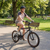 20-inch black cycling bike with LED lights, 6-speed shifting, and wireless speakers, perfect for outdoor rides.