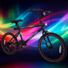 20-inch black LED-lit cycling bike with speakers, 6-speed shifting, and ambient lights for men and women.