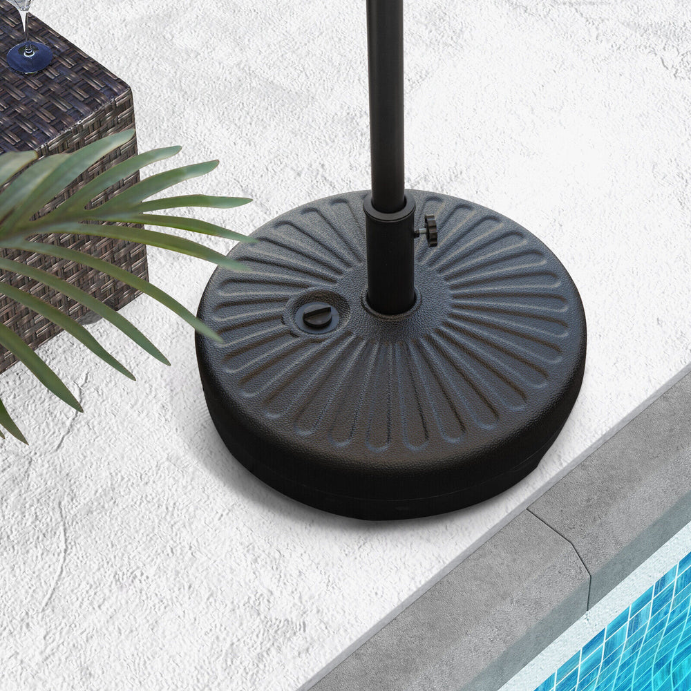 20-inch round umbrella base stand featuring a built-in handle for easy transport, designed for stability and durability.