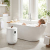 Large white towel warmer with LCD display, holding towels, ideal for bathroom comfort and relaxation.