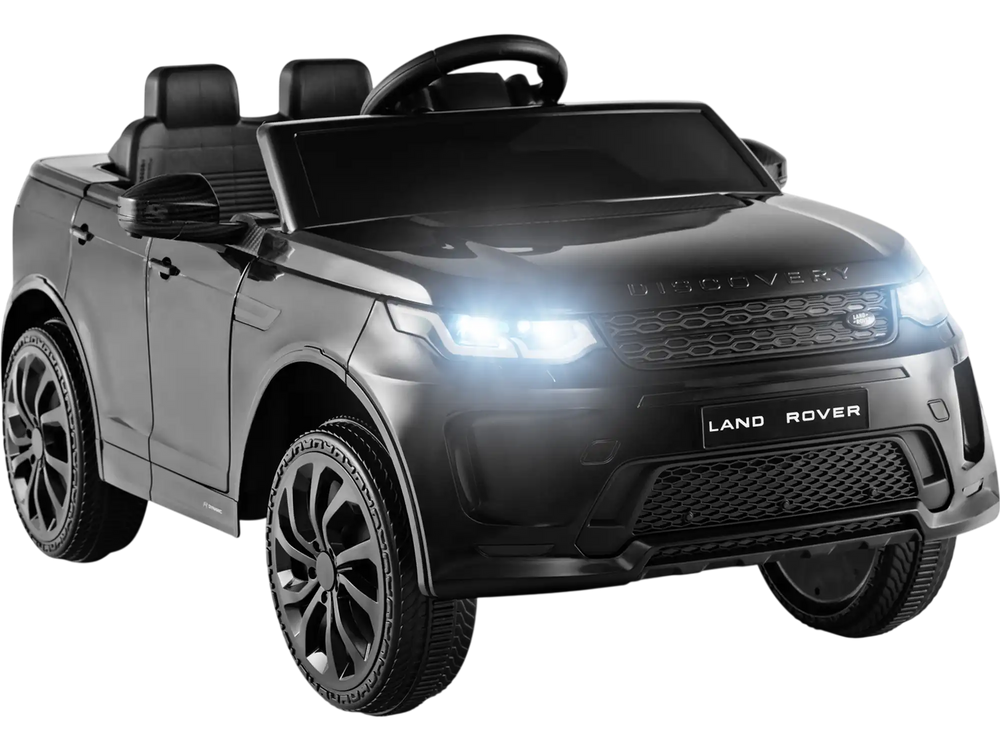 Black Land Rover licensed 12V kids ride-on car with remote control, LED lights, and realistic design for outdoor fun.