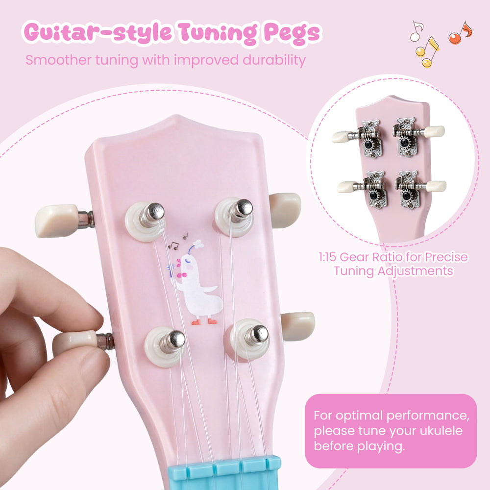 Close-up of the pink 21-inch children's ukulele headstock with guitar-style tuning pegs for easy string adjustments.