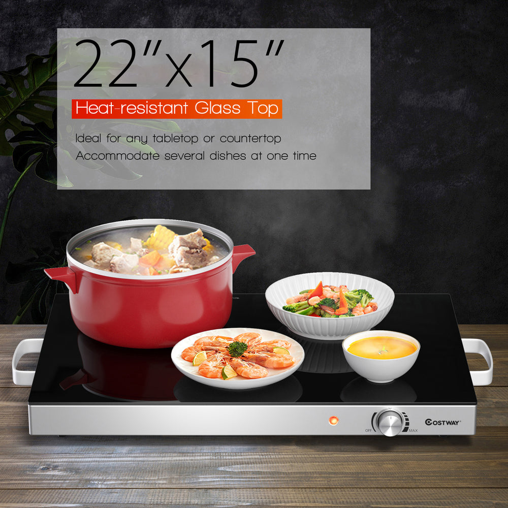 Electric warming tray with heat-resistant glass top, adjustable temperature, ideal for buffets and family dinners.