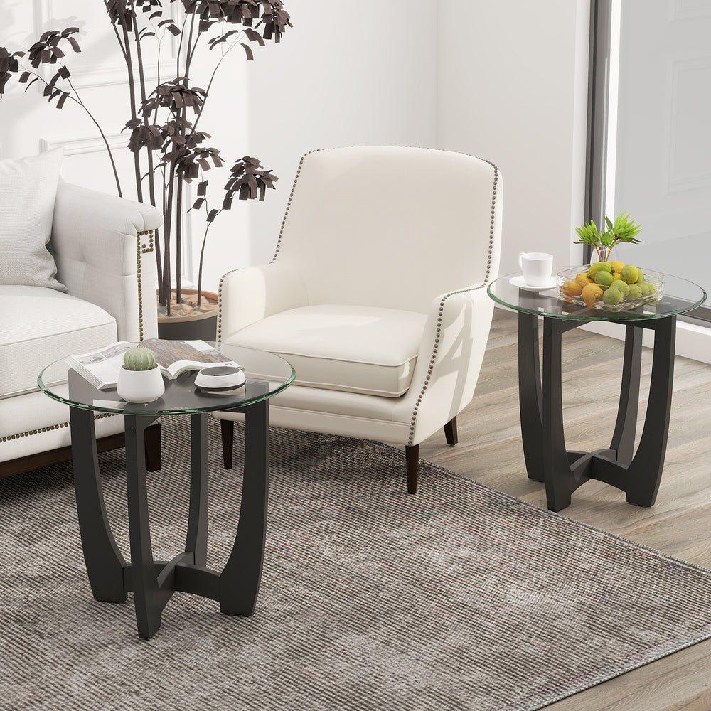 Round end side table with tempered glass tabletop and black rubber wood frame, perfect for drinks and decor.