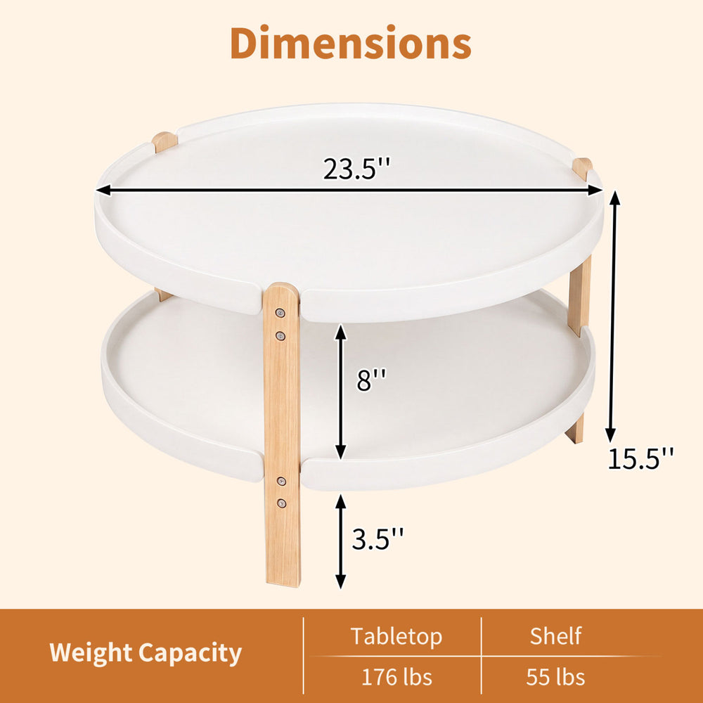 Two-tier round coffee table with solid wood legs, white finish, and open storage shelf for organized living spaces.