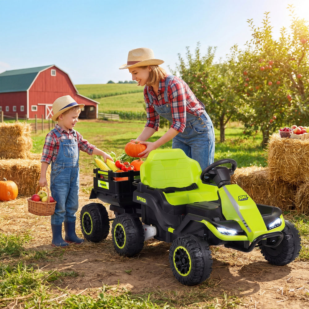 Green 24V ride-on tractor with detachable trailer, featuring a child and parent in a farm setting, perfect for outdoor.