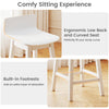 24.5-inch swivel wooden bar stool set with rubber wood legs, low back, and footrests for comfortable dining experiences.