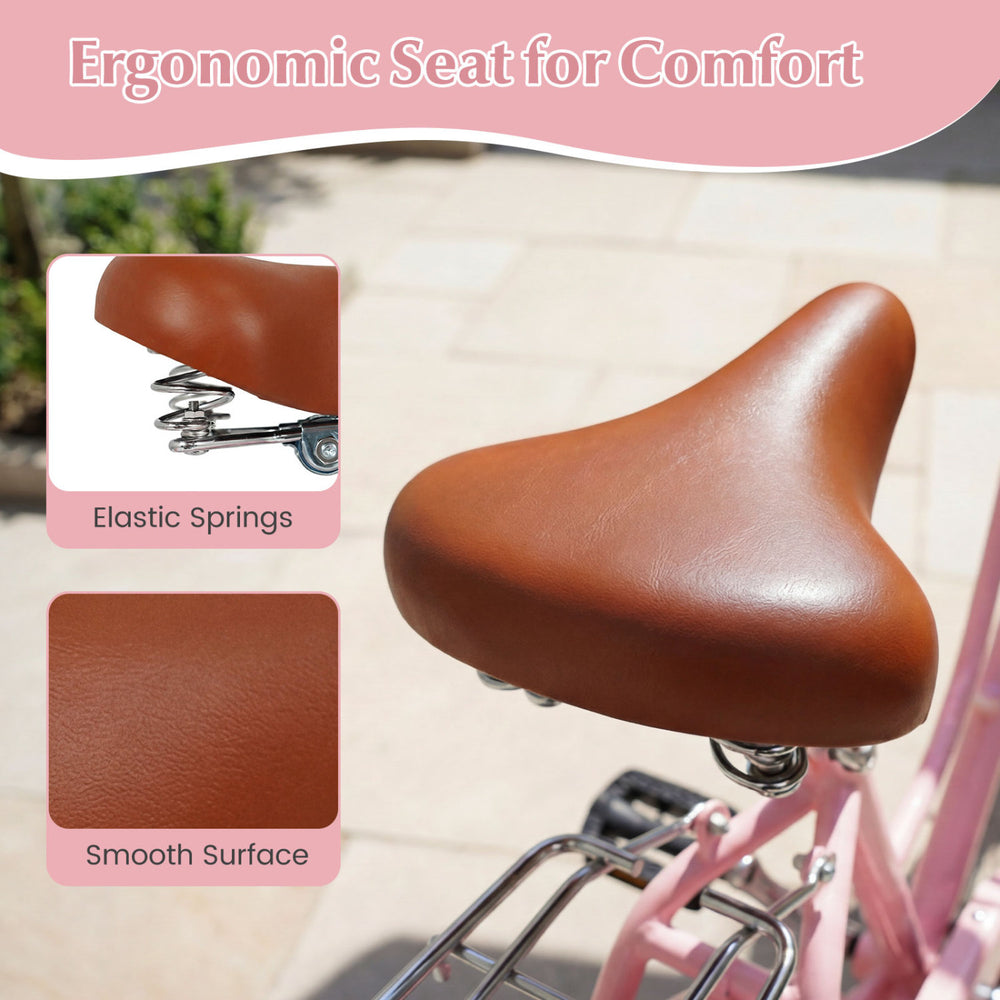 Close-up of the ergonomic bike seat with elastic springs, smooth surface, designed for comfort on the pink 24-inch.