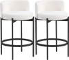 Set of 2 24-inch boucle counter stools with curved backrest, featuring sherpa fabric and sturdy metal frame for kitchen.