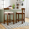 Side view of a 24-inch counter height bar stool with beige linen seat and solid rubber wood frame, ideal for kitchen.
