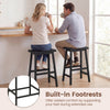 Backless 24-inch black saddle bar stools with built-in footrests, perfect for kitchen island seating and space-saving.