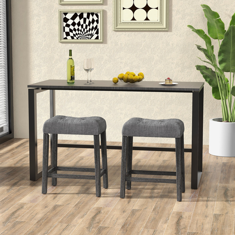 Set of 2 gray saddle bar stools with padded seats, featuring a solid rubber wood frame and space-saving design.