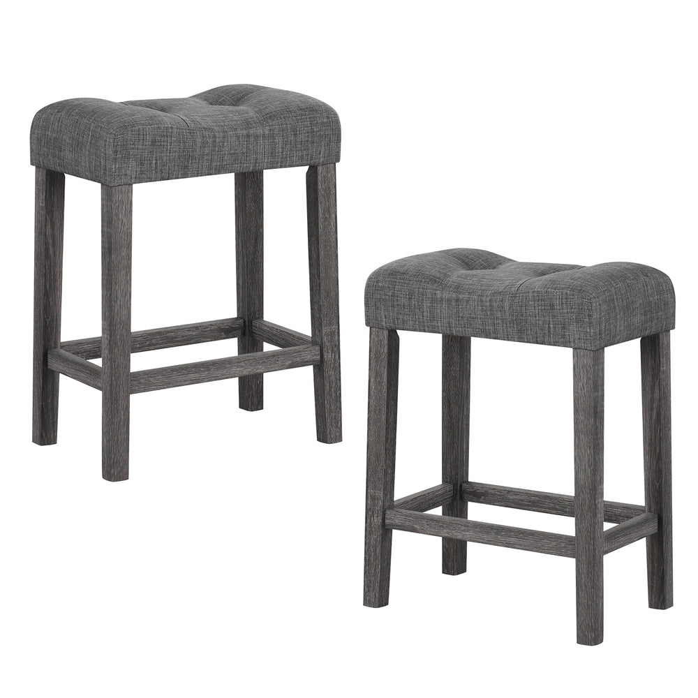 Set of 2 gray saddle bar stools with padded seats, button-tufted design, and solid rubber wood frames for comfort.
