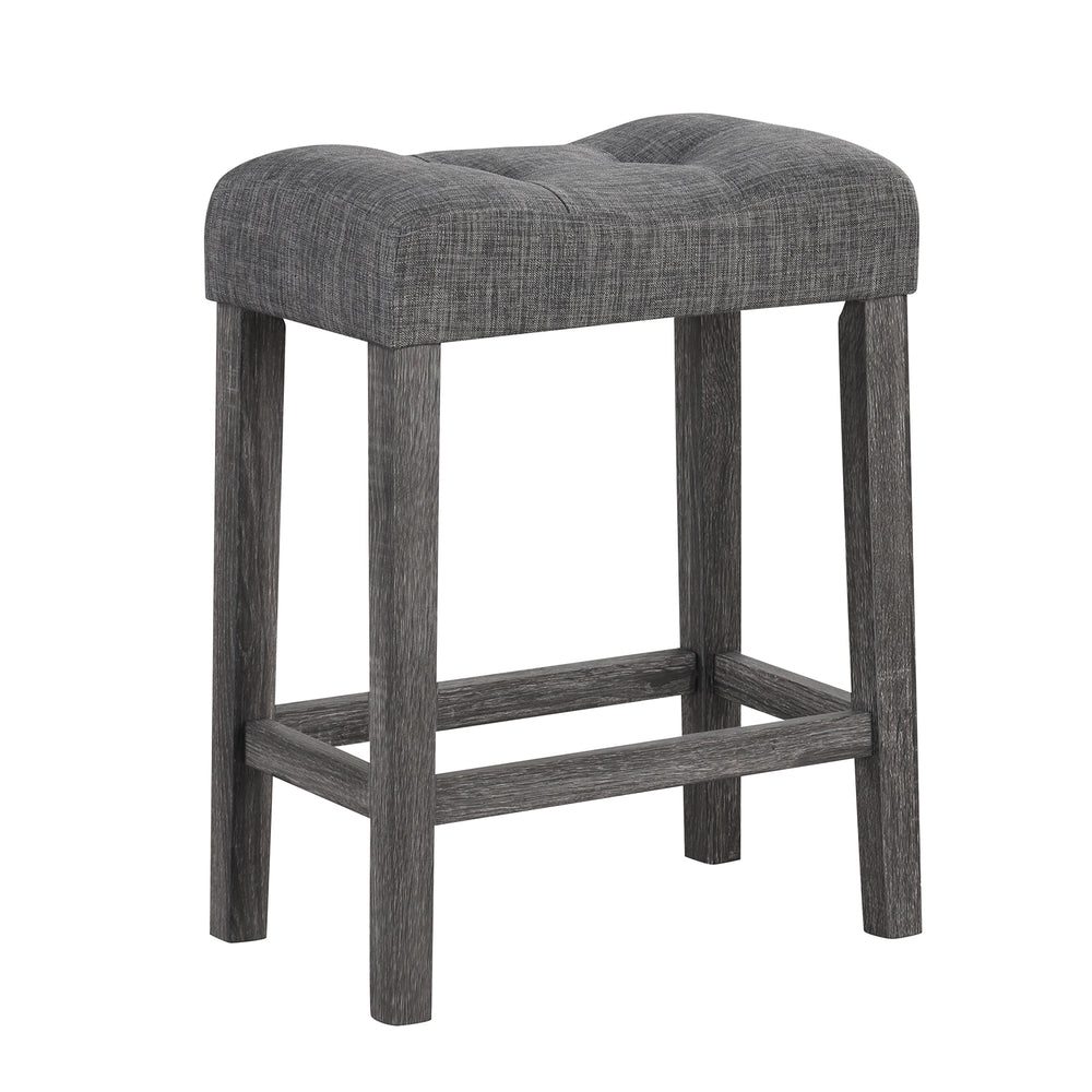 Backless 24-inch gray saddle bar stool with padded seat, button-tufted design, and solid rubber wood frame.
