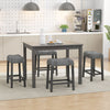 Set of 2 gray saddle bar stools with padded seats, featuring a solid rubber wood frame and button-tufted design for.