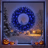 24-inch pre-lit Halloween wreath featuring 35 purple LED lights, perfect for festive indoor decoration and creating a spooky atmosphere.