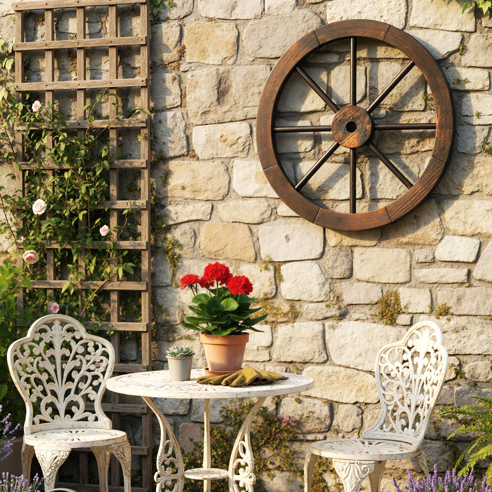 Decorative 24-inch wooden wagon wheel in carbonized fir wood, enhancing rustic charm for indoor and outdoor spaces.