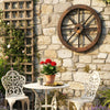 Decorative 24-inch wooden wagon wheel in carbonized fir wood, enhancing rustic charm for indoor and outdoor spaces.