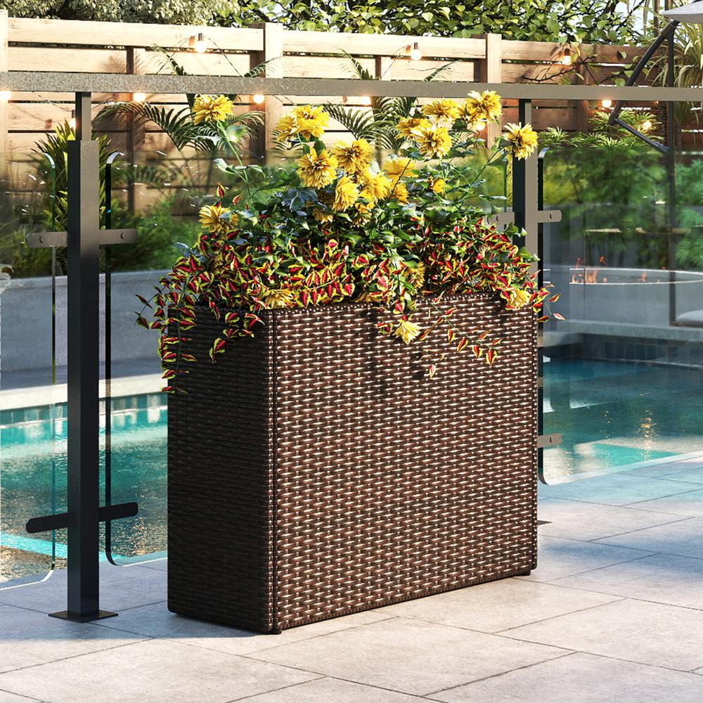 Tall raised garden bed made of weatherproof PE rattan, featuring vibrant flowers, ideal for outdoor patios.