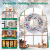 Pre-lit Christmas wreath with 106 frosted branch tips and 35 color-changing LED lights displayed in a snowy window.