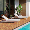 Acacia wood interlocking deck tiles in natural finish, ideal for outdoor use on patios, balconies, and poolside areas.