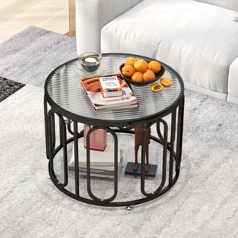 24-inch round coffee table with reeded tempered glass top and black oval swivel brackets, perfect for stylish living.