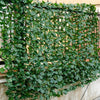 Faux ivy leaf decorative privacy fence, 40 x 95 inches, featuring realistic green leaves for indoor and outdoor privacy.