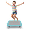 A child jumps on a 25.5" mini trampoline with non-slip foot pads, perfect for indoor and outdoor play.