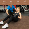 Wood grain foam floor mats in brown, providing shock absorption and noise reduction for gym workouts.
