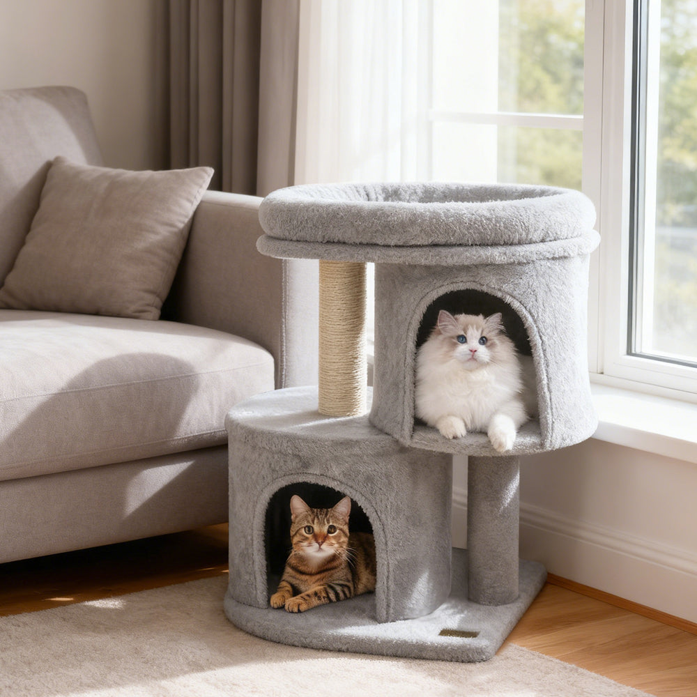 Cat tower in light gray featuring dual condos, large padded perch, and sisal scratching post for multi-cat households.