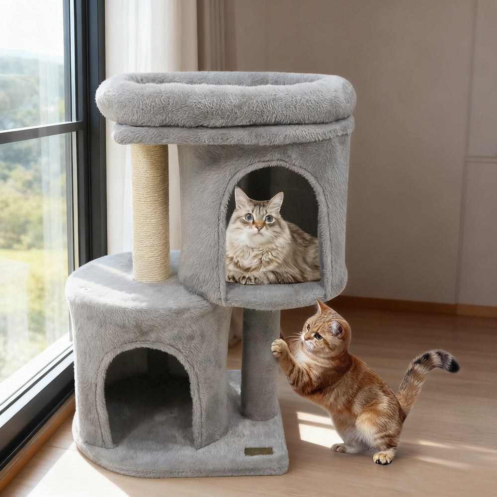 Large padded perch and dual condos on a 26-inch light gray cat tower, perfect for multi-cat households.