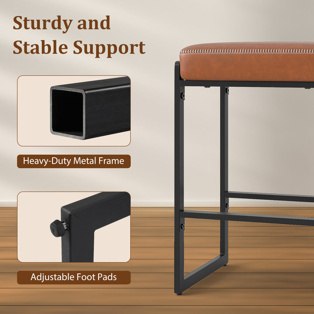 Close-up of the heavy-duty metal frame of 26-inch bar stools with adjustable foot pads for stable support.